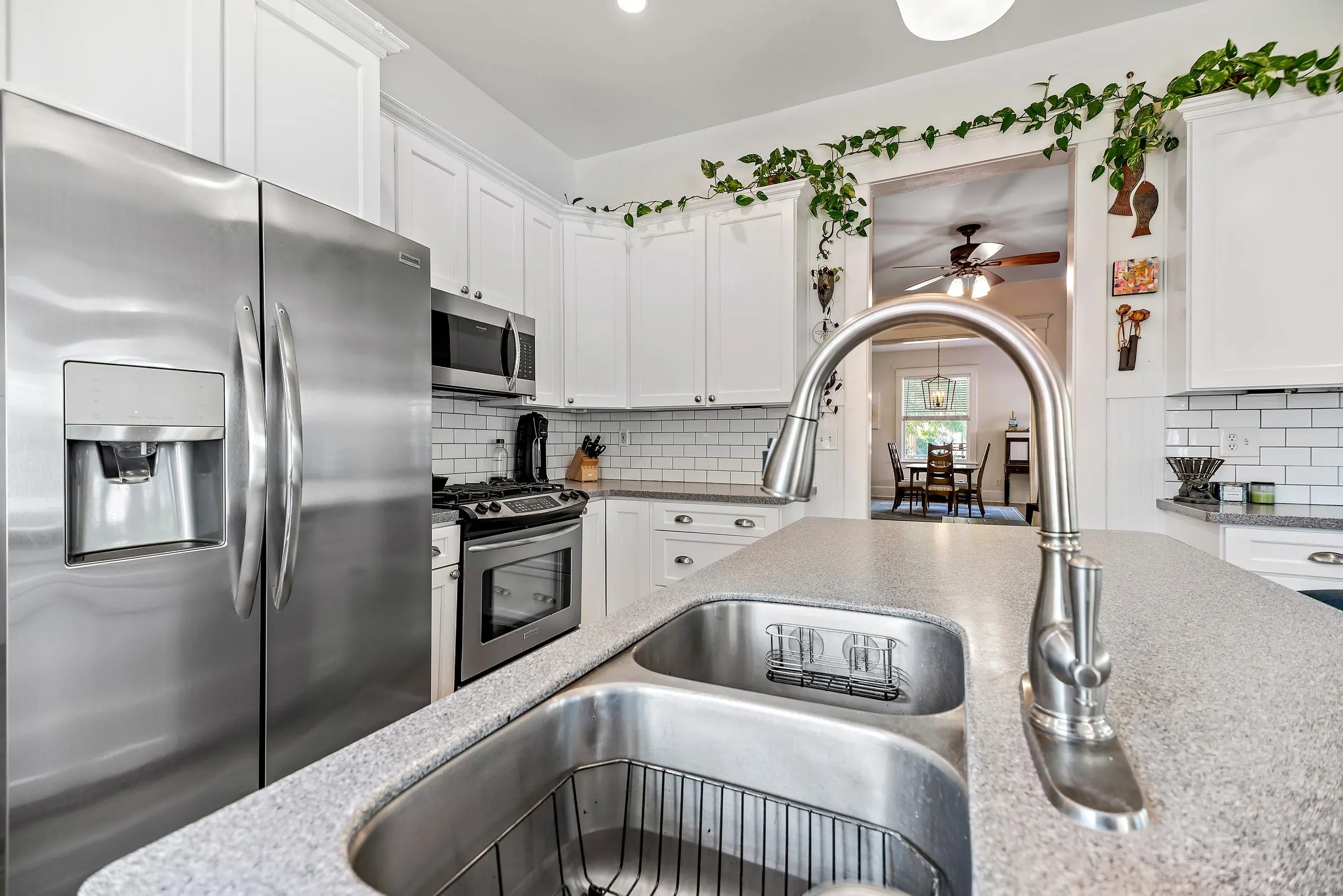 Kitchen with a sink and stainless appliances